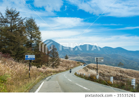 A motorcycle that runs in the autumn Nagano Venus Line A motorcycle that runs in the autumn Nagano Venus Line 35535261