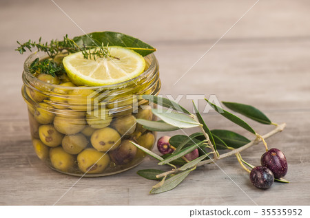 Green olives preserved in jar, preserve 35535952
