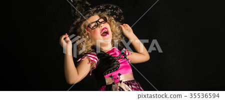 Attractive girl in witch halloween costume Attractive girl in witch halloween costume 35536594