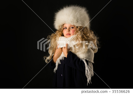 Pretty girl in winter clothes 35536626