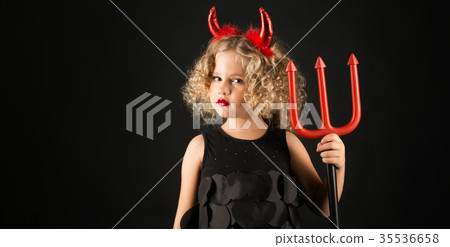 Cute girl in devil costume 35536658