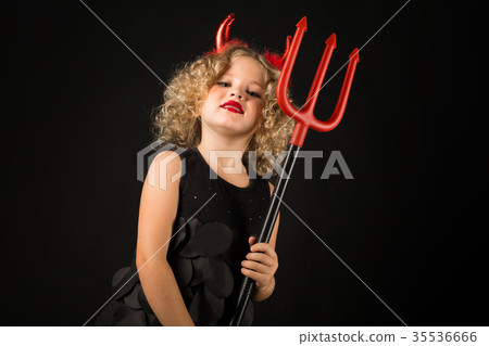 Cute girl in devil costume 35536666
