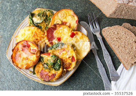 Creative baked egg meal with various ingredients Creative baked egg meal with various ingredients 35537526