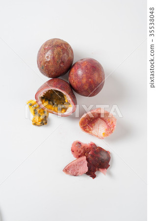 Group of passion fruits on white table 35538048