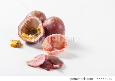 Group of passion fruits on white table 35538049