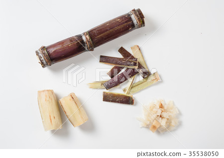 Sugar cane condiments on white table 35538050