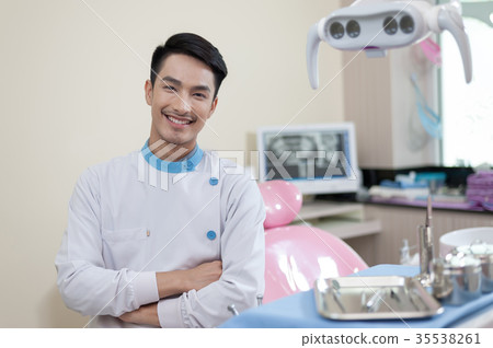 Male dentist crossing armin dental clinic Male dentist crossing armin dental clinic 35538261