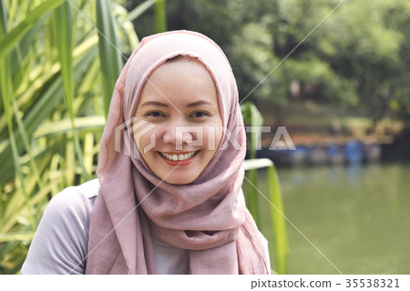 Young asian muslim woman in hijab with smiley face 35538321