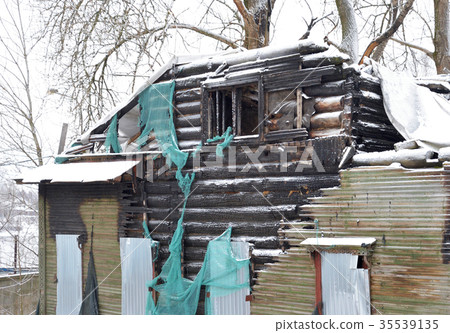 Burnt building at winter. 35539135