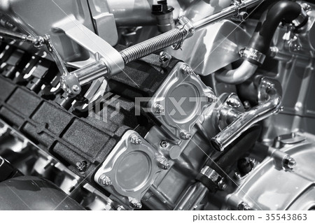V12 car engine fragment, closeup photo V12 car engine fragment, closeup photo 35543863
