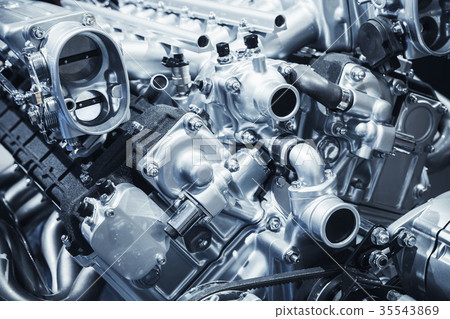 Shiny motor details, V12 car engine fragment 35543869