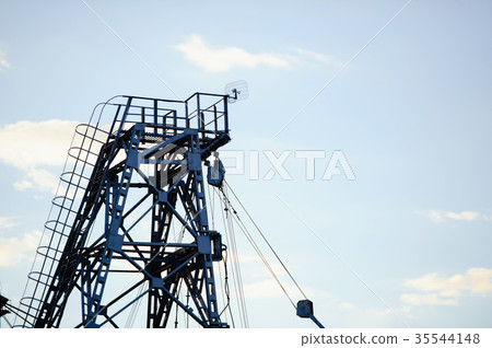 metal tower of gas and oil extraction against  sky 35544148