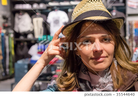 Beautiful girl close up portrait. Woman in shop is Beautiful girl close up portrait. Woman in shop is 35544640