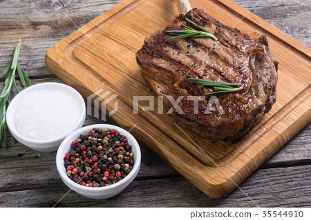 Grilled tomahawk steak 35544910