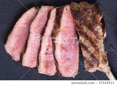 Grilled tomahawk steak Grilled tomahawk steak 35544913