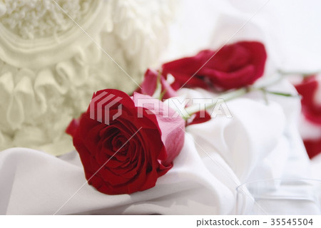 Red rose and cake, wedding or valentine concept Red rose and cake, wedding or valentine concept 35545504