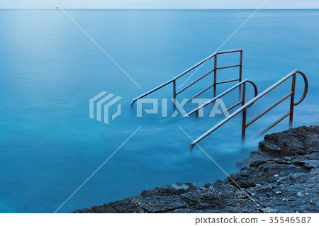 Swim ladder leading to mystic sea 35546587