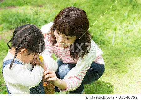 Parent and child playing in the park Parent and child playing in the park 35546752