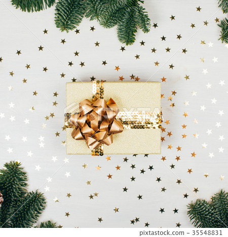 Christmas presents with golden ribbon Christmas presents with golden ribbon 35548831