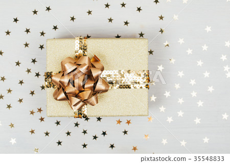 Christmas presents with golden ribbon Christmas presents with golden ribbon 35548833