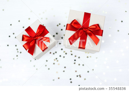 Two presents with red bow Two presents with red bow 35548836