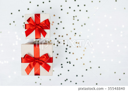 Two presents with red bow Two presents with red bow 35548840