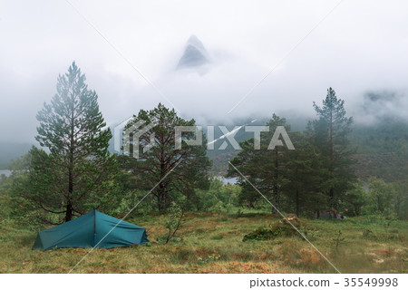 Mountain peak in fog in Innerdalen 35549998