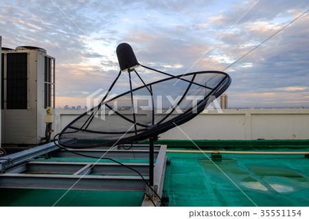 Satellite dish receiver stand on the rooftop 35551154