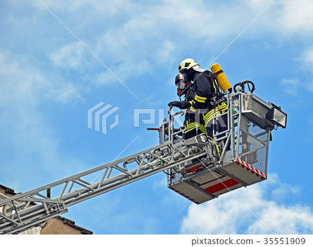 Firefighters on a ladder Firefighters on a ladder 35551909