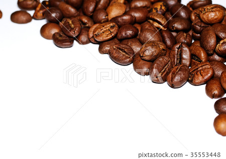 Coffee Grains fried on a white background. Macro 35553448
