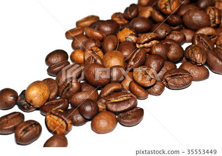 Coffee Grains fried on a white background. Macro 35553449