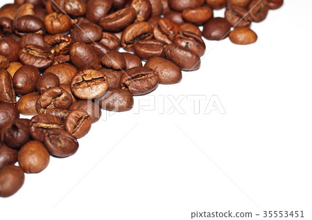 Coffee Grains fried on a white background. Macro 35553451