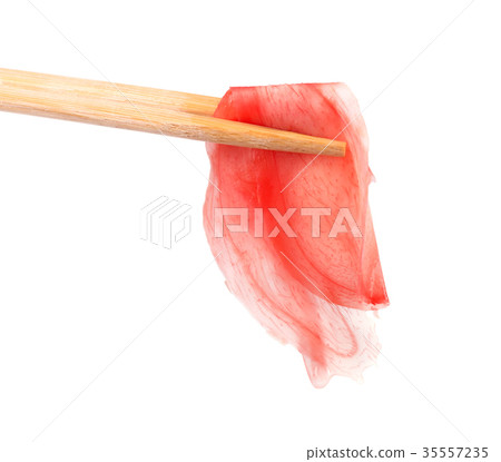 Pile of marinated ginger slices isolated on white 35557235