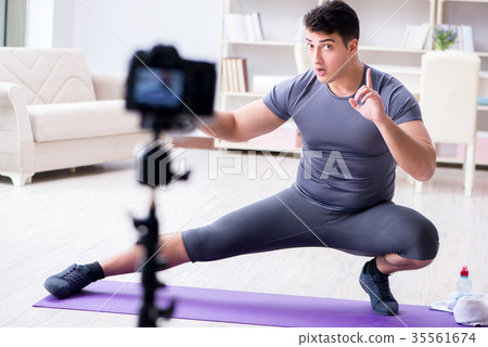 Sports and health blogger recording video in sport Sports and health blogger recording video in sport 35561674