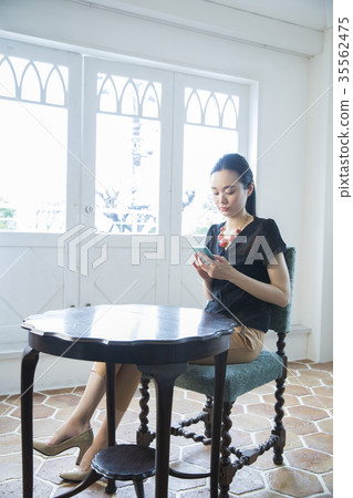 young woman      35562475