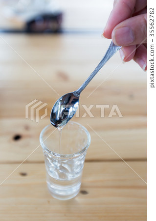 syrup in glass bottle syrup in glass bottle 35562782