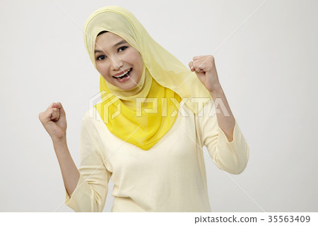 celebrating with arm raised celebrating with arm raised 35563409