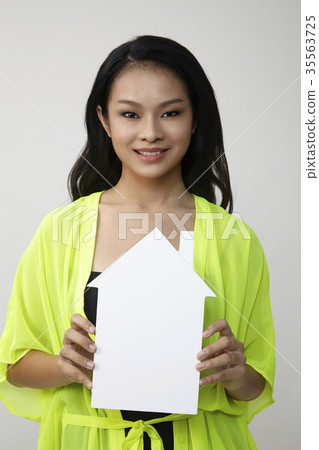 woman holding a house 35563725