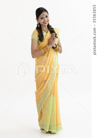 Woman greeting in mekhla Woman greeting in mekhla 35563855