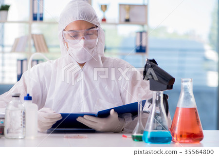 Chemist working in the lab Chemist working in the lab 35564800
