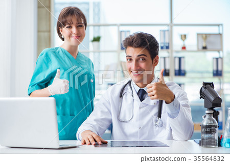 Two doctors having discussion in the hospital 35564832