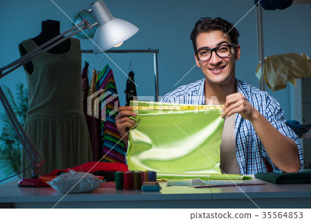 Male tailor working in sewer shop 35564853