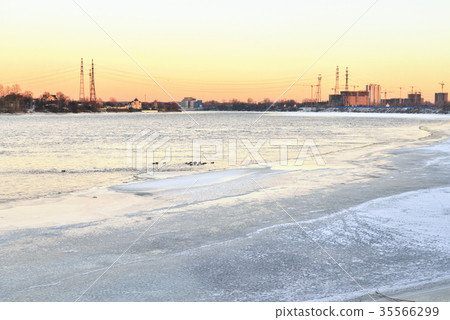 View of Neva River at winter sunset. 35566299
