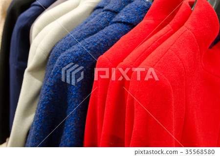 Womens cashmere coats of different colors in store 35568580