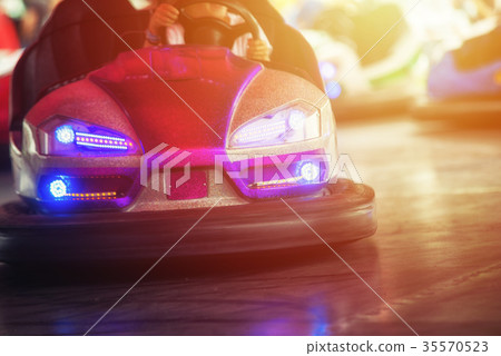 Colorful electric bumper car in autodrom Colorful electric bumper car in autodrom 35570523