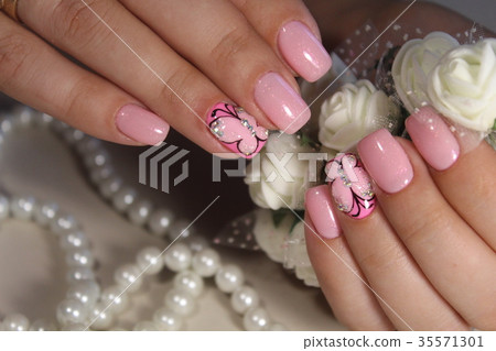 Manicure nail design with a butterfly pattern 35571301