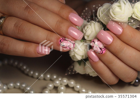Manicure nail design with a butterfly pattern Manicure nail design with a butterfly pattern 35571304