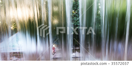 Water from the waterfall as a backdrop 35572037