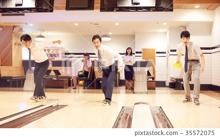 Business person enjoying bowling