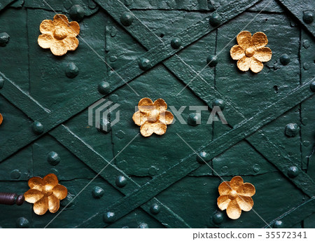 old door with golden ornaments old door with golden ornaments 35572341